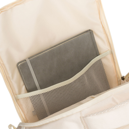 Praktischer Reise-Rucksack in Ecru, ausgestattet mit einem Netzfach und Kompressionsriemen – Peterson