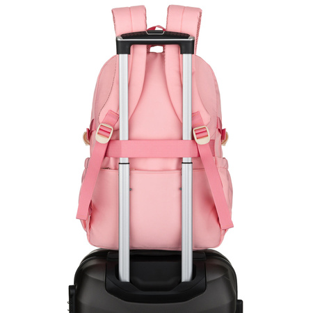 Modischer Schulrucksack aus Polyester in Rosa, an verstellbaren Trägern hängend - Peterson