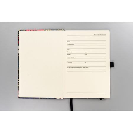 Blumiges, farbenfrohes Notizbuch mit Punktmuster – Peterson