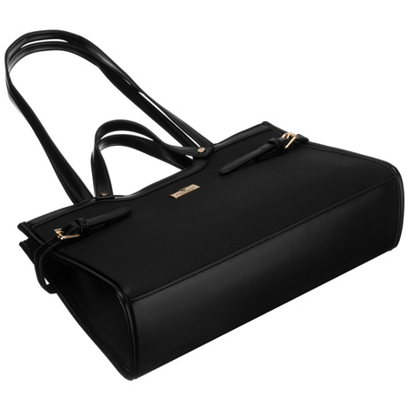 Schwarze Damenhandtasche mit Magnetverschluss, an bequemen Tragegriffen getragen – Peterson