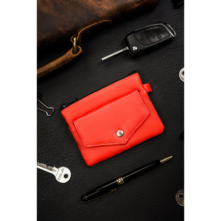 Orangefarbene Schlüsselbörse aus Leder mit Reißverschlusstaschen