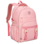 Modischer Schulrucksack aus Polyester in Rosa, an verstellbaren Trägern hängend - Peterson