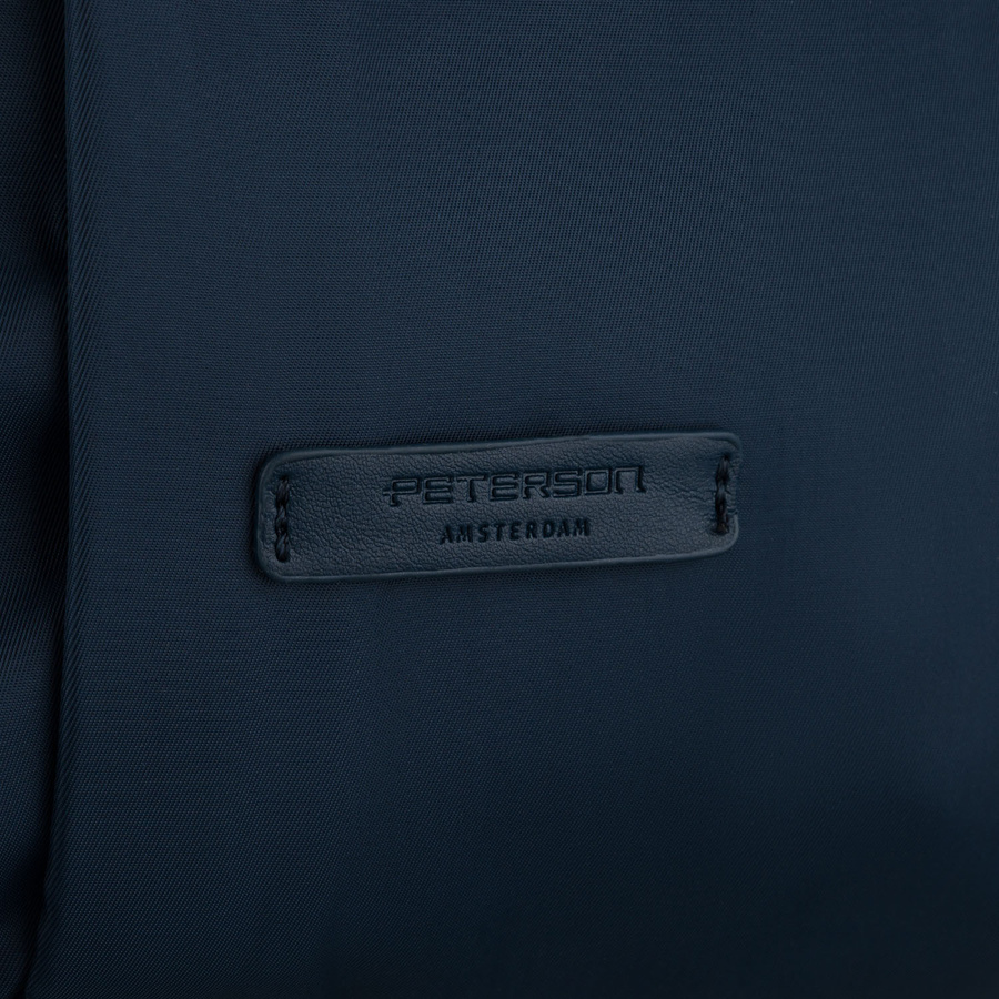 Damen-Rucksack aus Nylon in Marineblau mit einem Befestigungsgriff für den Koffer – Peterson – Bild 11