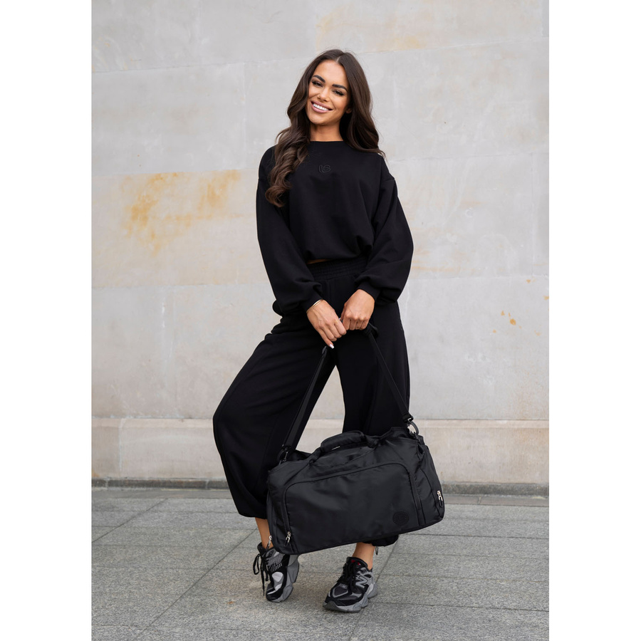 Schwarze Reisetasche mit Koffergurt – Peterson – Bild 21