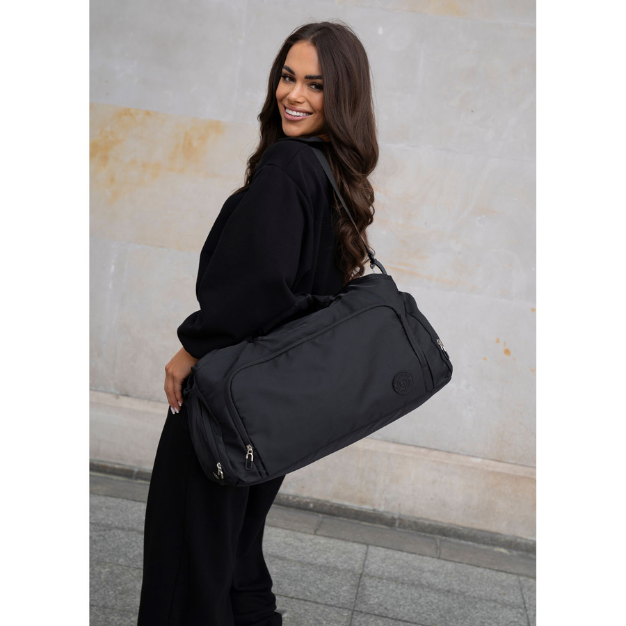 Schwarze Reisetasche mit Koffergurt – Peterson – Bild 20