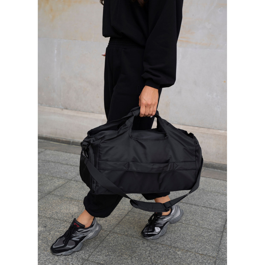 Schwarze Reisetasche mit Koffergurt – Peterson – Bild 24