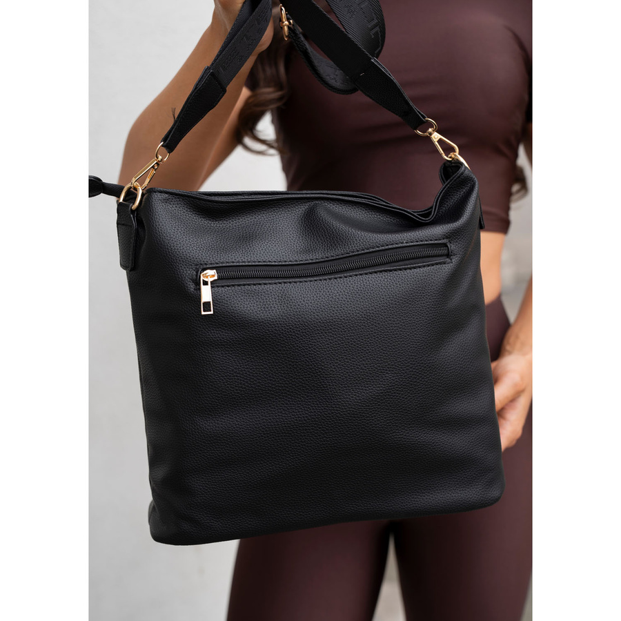 Städtische Damenhandtasche aus Öko-Leder in schwarzer Farbe, an verstellbarem Gürtel hängend - Peterson – Bild 17