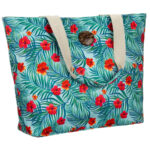 Modische Damenhandtasche im Blumenmuster, an bequemen Griffen hängend